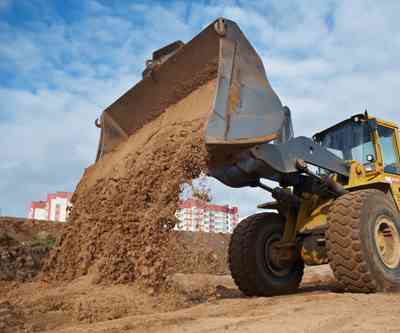 front end loader dumping mining