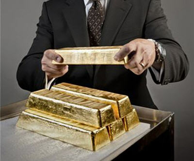 Gold price drops below $1,600
