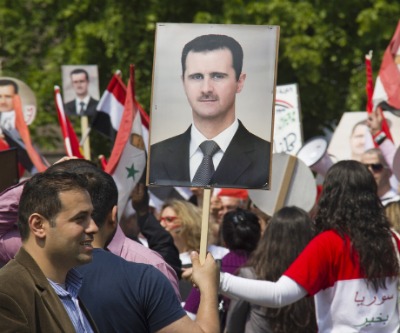 Gold price falls to near month-low on Syria deal