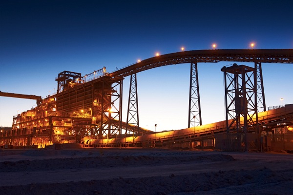 BHP warns more cost cuts, management shake up before demerger