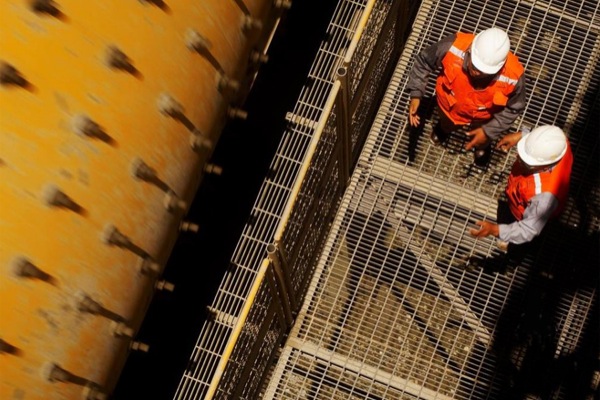 Glencore hit by $790 million writedown, cuts spending