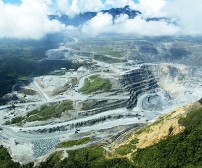 Pacific Battle Over Gold Mine Ends With Barrick Stake Deal