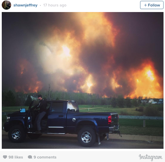 Canadian oil sands camps evacuated as wildfire shifts north