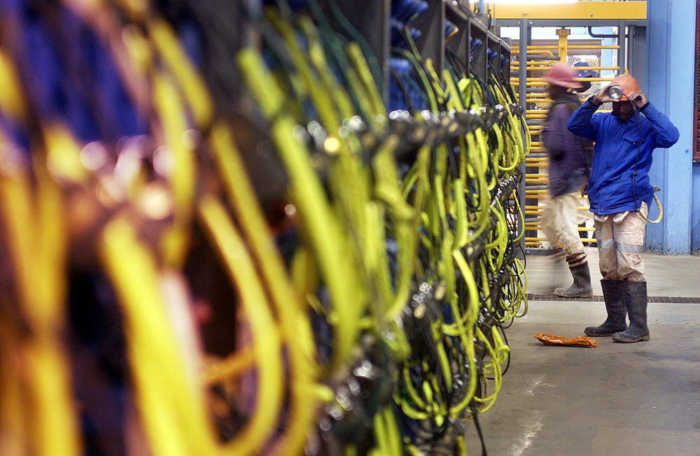 South Africa’s deep mines grapple with thousands returning to work