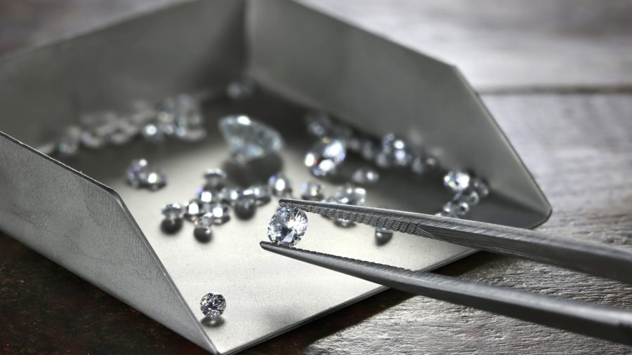 Botswana president insists on bigger share of diamonds from De Beers venture