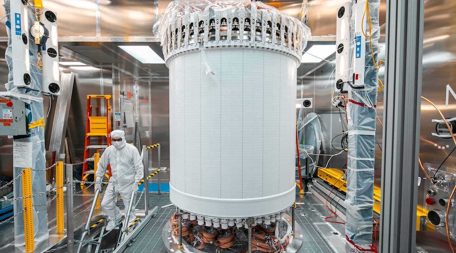 A mile below the surface in South Dakota in an abandoned gold mine, using a detector that is part of the LUX-ZEPLIN experiment, a UMD physics team is hunting for a yet-undiscovered particle that could explain dark matter.