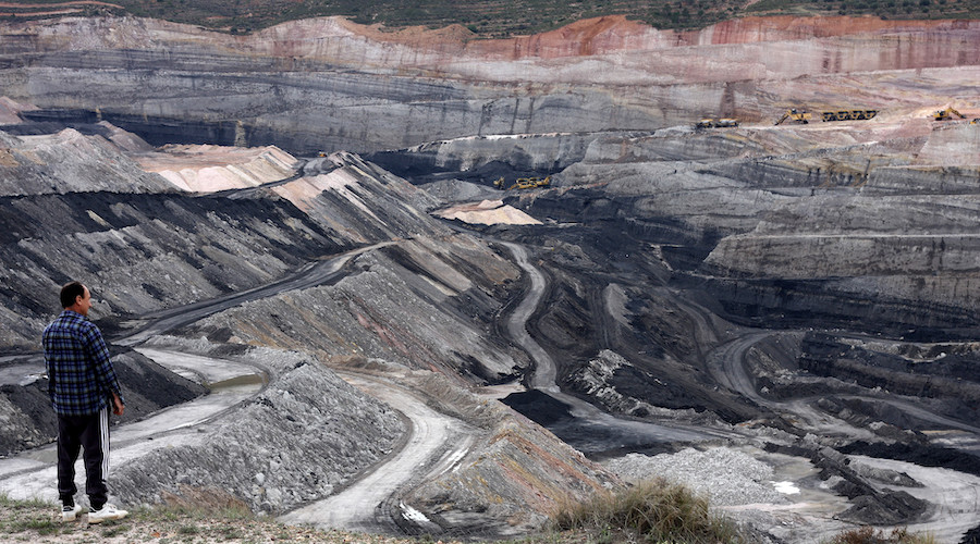 Coal, oil, gas resources should remain in the ground to reach Paris Agreement goals – study
